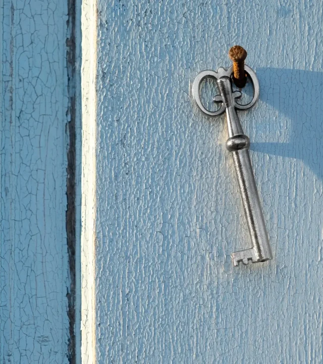 Dienstleistungen: Der Schlüssel mit dem blauen Hintergrund